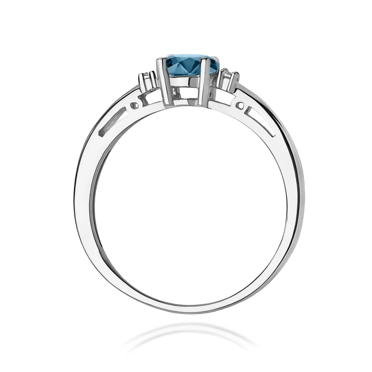 Pierścionek owalny Topaz London Blue 0,50ct białe złoto