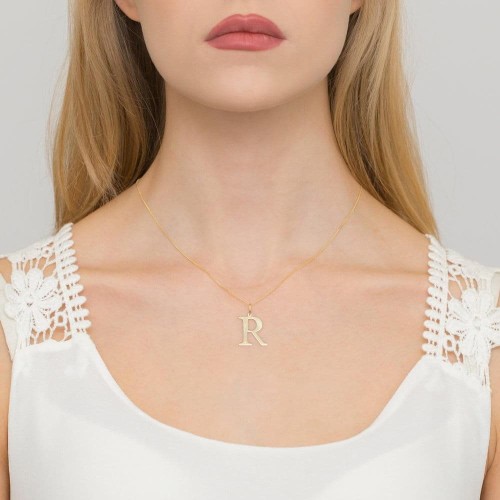 Złota zawieszka litera R z brylantem