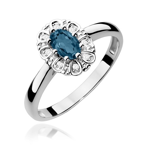 Pierścionek z białego złota z Topazem w ozdobnej oprawie z brylantami