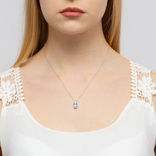 Zawieszka z Topazem i Brylantem owalna z białego złota