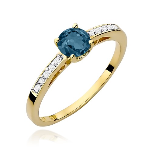 Złoty pierścionek z Topazem London Blue i brylantami na szynie