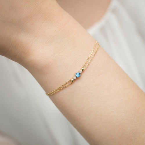 Bransoletka na podwójnym łańcuszku z topzem i brylantami