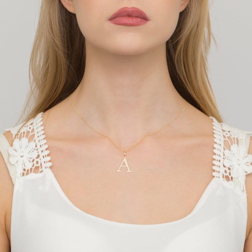 Złota zawieszka litera A z brylantem