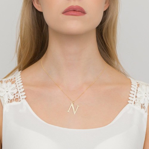 Złota zawieszka litera N z brylantem