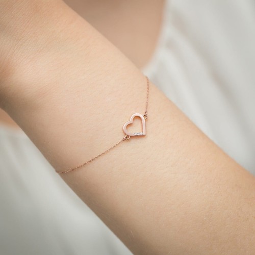 Bransoletka z różowego złota z serduszkiem brylanty