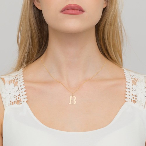 Złota zawieszka litera B z brylantem