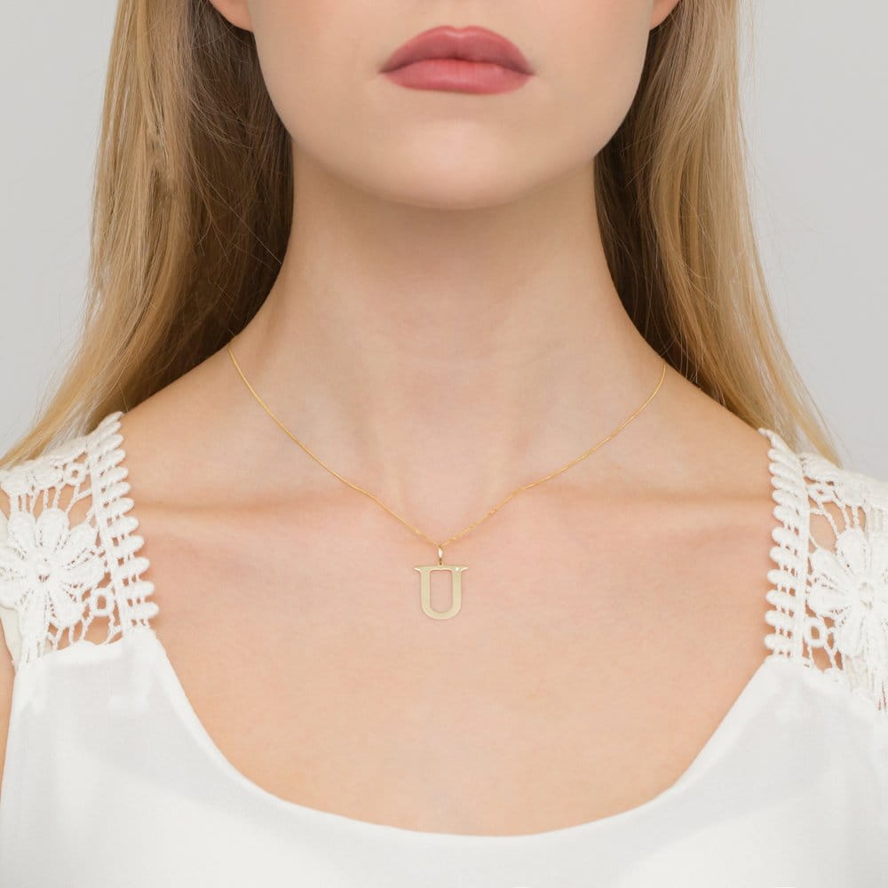 Złota zawieszka litera U
